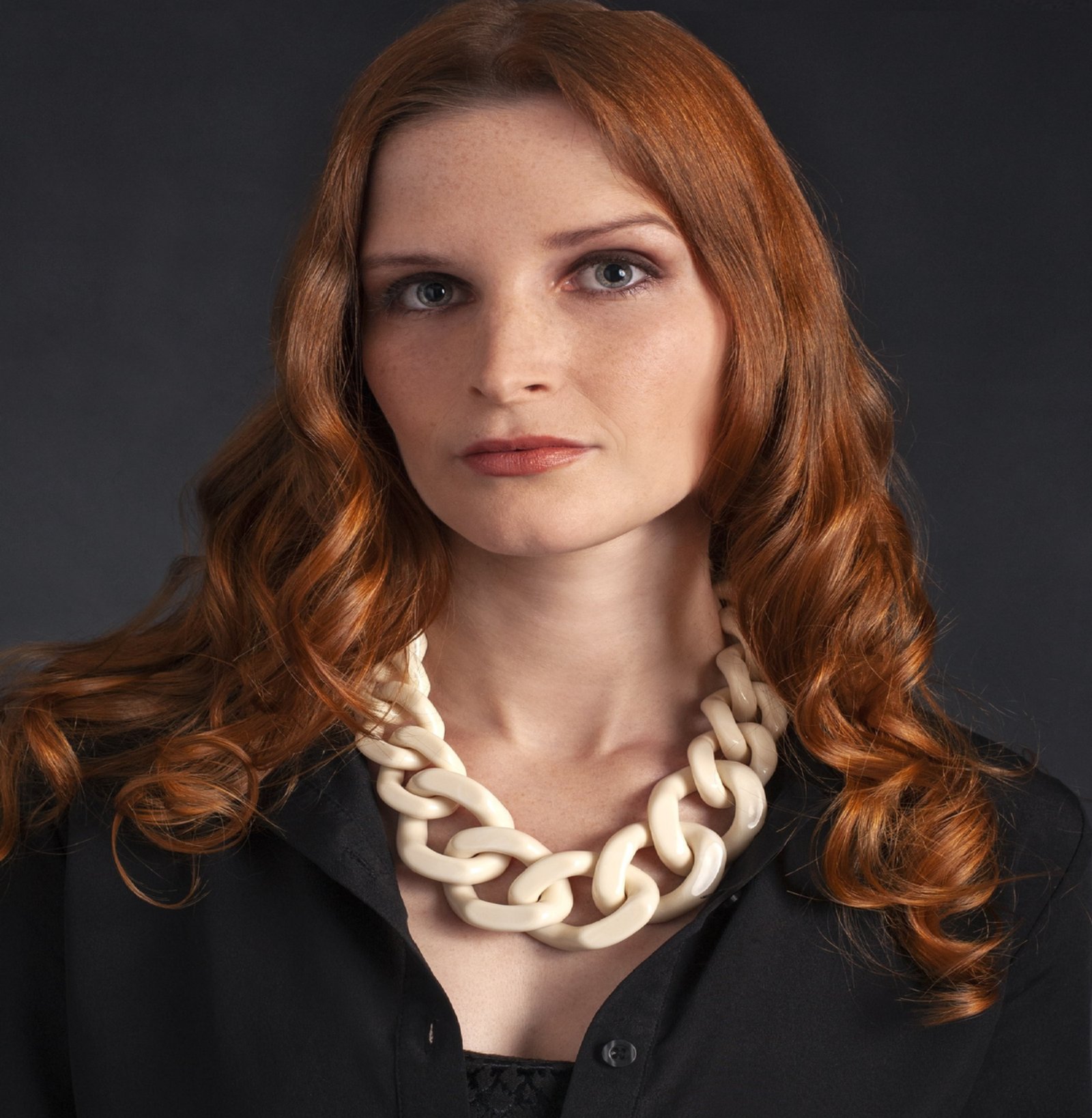 The Ivory Chain worn with a white blouse